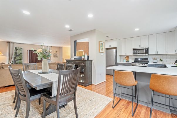 Dining room, Interior, Kitchen, Recessed Lighting, Stainless Steel Appliances, Wood Texture Flooring