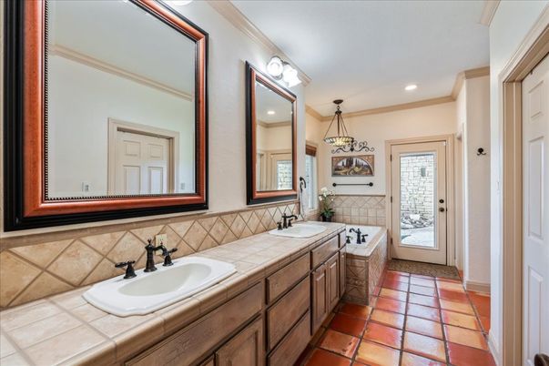 Bathroom, Dual Sink Vanities, Interior, Pendant Lights, Recessed Lighting, Tile Countertops