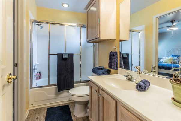 Bathroom, Bedroom, Glass Shower, Interior, Recessed Lighting, Wood Texture Flooring
