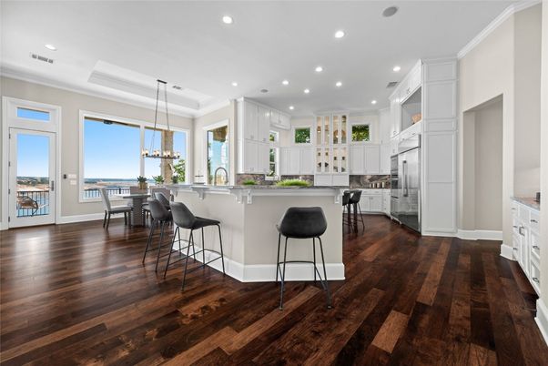 Chandelier, Dining room, Interior, Kitchen, Pendant Lights, Recessed Lighting, Water, Wood Texture Flooring