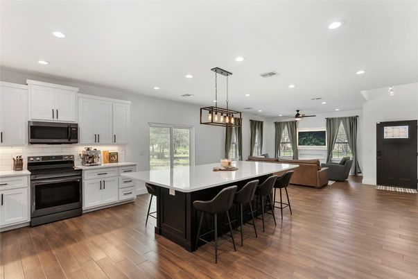 Interior, Kitchen, Living room, Pendant Lights, Recessed Lighting, Stainless Steel Appliances, Wood Texture Flooring