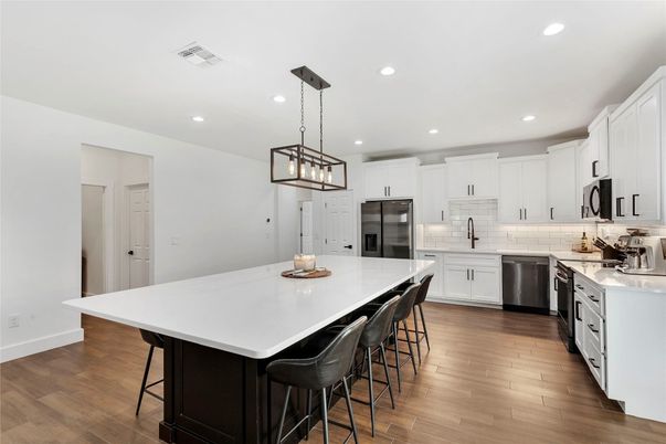 Interior, Kitchen, Pendant Lights, Recessed Lighting, Stainless Steel Appliances, Wood Texture Flooring