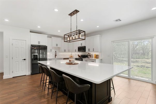 Interior, Kitchen, Pendant Lights, Recessed Lighting, Stainless Steel Appliances, Wood Texture Flooring