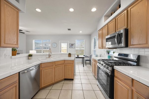 Dining room, Interior, Kitchen, Recessed Lighting, Stainless Steel Appliances, Tile Countertops