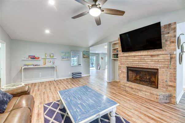 Fireplace, Interior, Recessed Lighting, Stone Walls, Wood Texture Flooring