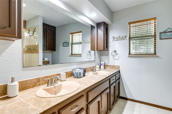 Bathroom, Dual Sink Vanities, Interior, Recessed Lighting, Tile Countertops