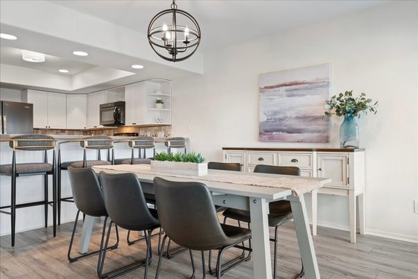 Dining room, Interior, Kitchen, Pendant Lights, Recessed Lighting, Stainless Steel Appliances, Wood Texture Flooring