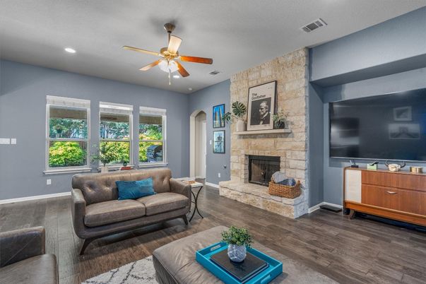 Fireplace, Interior, Living room, Recessed Lighting, Stone Walls, Wood Texture Flooring