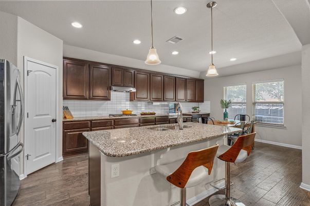Dining room, Interior, Kitchen, Pendant Lights, Recessed Lighting, Stainless Steel Appliances, Wood Texture Flooring