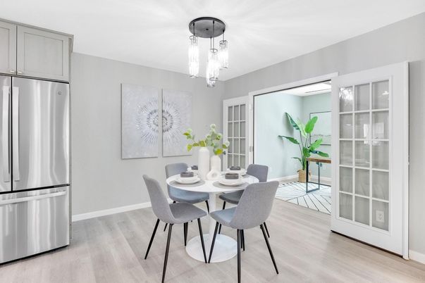 Chandelier, Dining room, Interior, Kitchen, Pendant Lights, Stainless Steel Appliances, Wood Texture Flooring