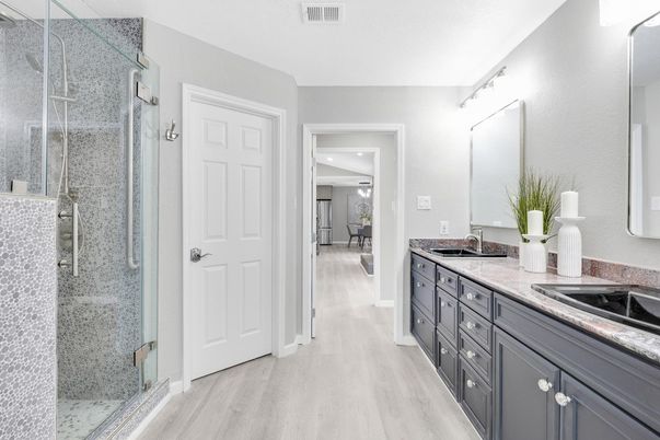 Bathroom, Dual Sink Vanities, Glass Shower, Interior, Recessed Lighting, Wood Texture Flooring