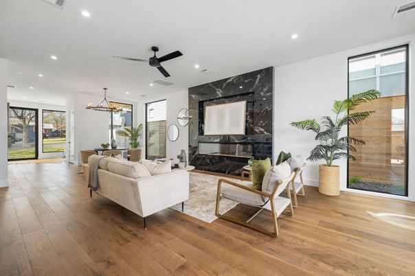 Dining room, Fireplace, Interior, Living room, Marble Walls, Pendant Lights, Recessed Lighting, Wood Texture Flooring