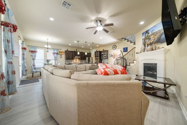 Chandelier, Dining room, Fireplace, Interior, Kitchen, Living room, Pendant Lights, Recessed Lighting, Wood Texture Flooring