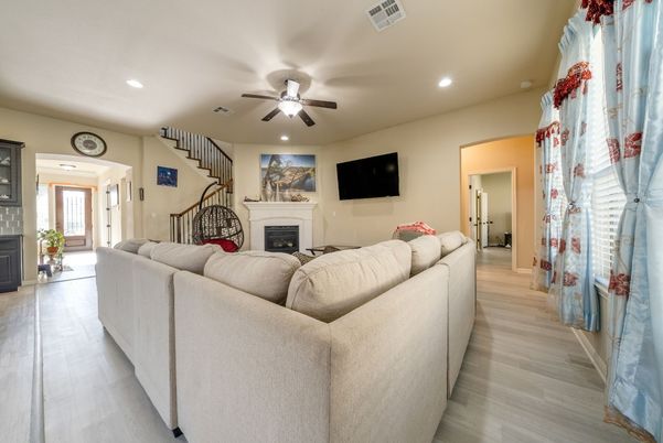 Fireplace, Interior, Living room, Recessed Lighting, Wood Texture Flooring