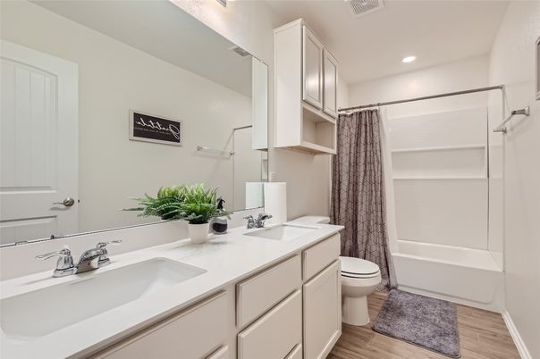 Bathroom, Dual Sink Vanities, Interior, Recessed Lighting, Wood Texture Flooring
