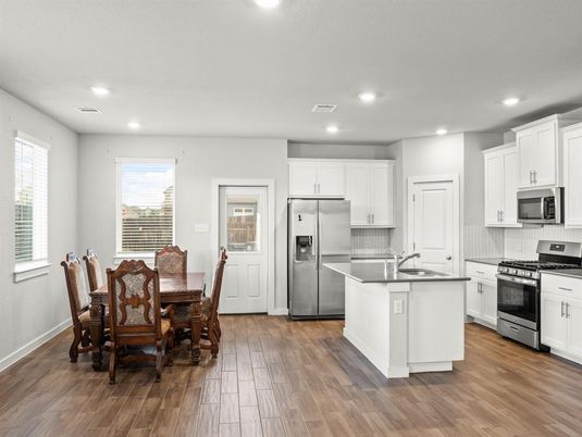 Dining room, Interior, Kitchen, Recessed Lighting, Stainless Steel Appliances, Wood Texture Flooring