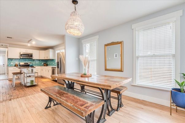 Chandelier, Dining room, Interior, Kitchen, Stainless Steel Appliances, Wood Texture Flooring