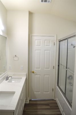 Bathroom, Dual Sink Vanities, Glass Shower, Interior, Wood Texture Flooring