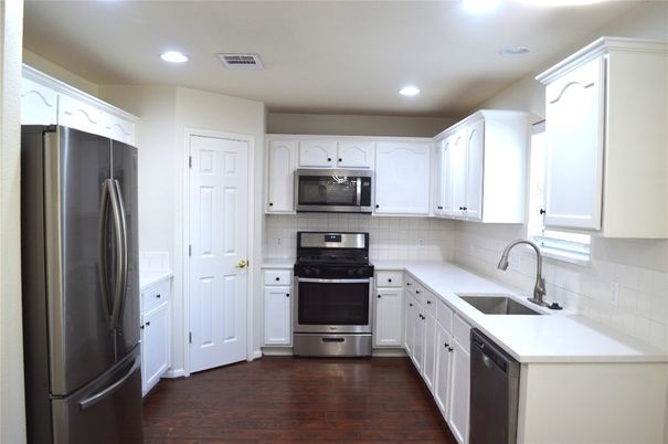 Interior, Kitchen, Recessed Lighting, Stainless Steel Appliances, Wood Texture Flooring