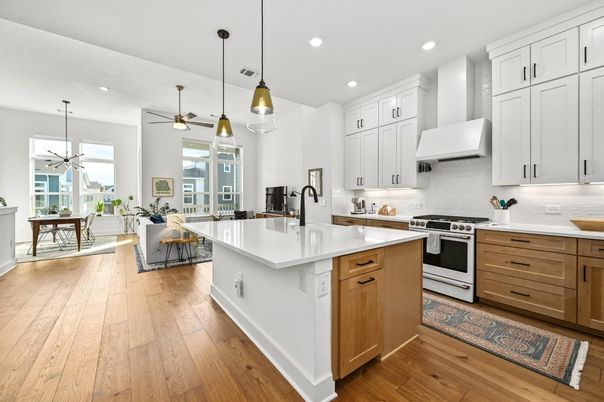 Dining room, Interior, Kitchen, Pendant Lights, Recessed Lighting, Stainless Steel Appliances, Wood Texture Flooring