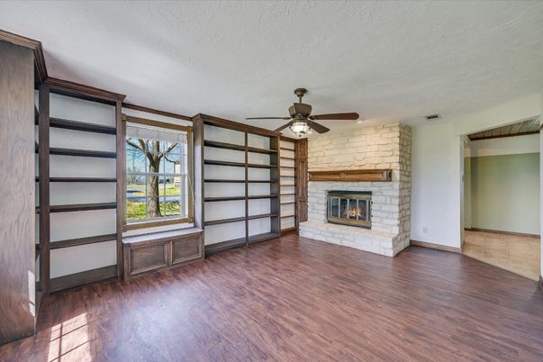Empty room, Fireplace, Interior, Stone Walls, Wood Texture Flooring
