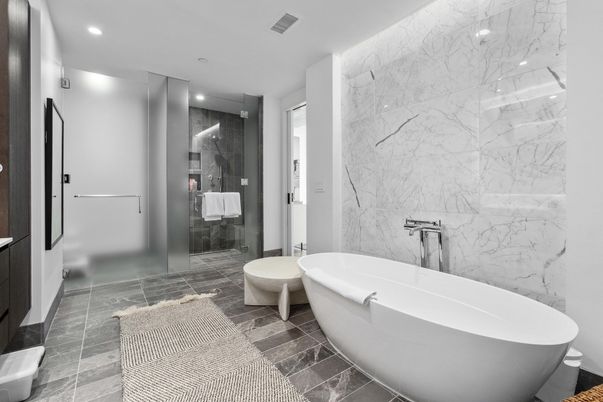 Bathroom, Free Standing Baths, Glass Shower, Interior, Marble Walls, Recessed Lighting