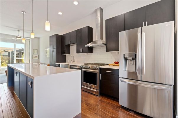 Interior, Kitchen, Pendant Lights, Recessed Lighting, Stainless Steel Appliances, Wood Texture Flooring