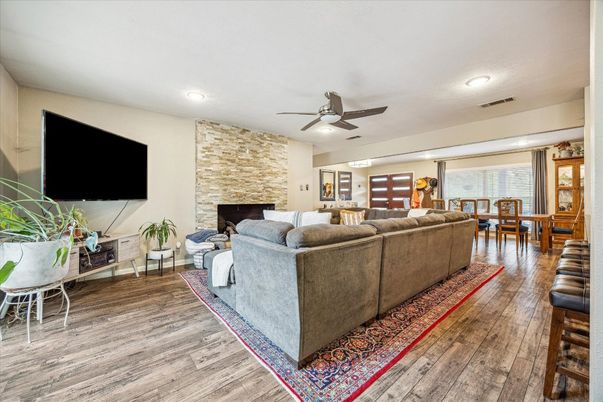 Dining room, Interior, Living room, Recessed Lighting, Stone Walls, Wood Texture Flooring