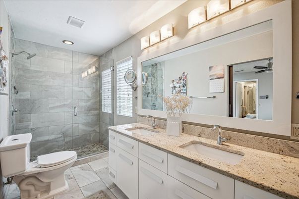 Bathroom, Dual Sink Vanities, Glass Shower, Interior, Marble Walls, Recessed Lighting