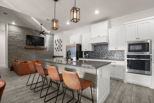 Interior, Kitchen, Pendant Lights, Recessed Lighting, Stainless Steel Appliances, Stone Walls, Wood Texture Flooring