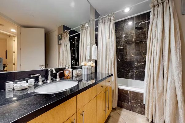 Bathroom, Dual Sink Vanities, Interior, Marble Walls, Recessed Lighting
