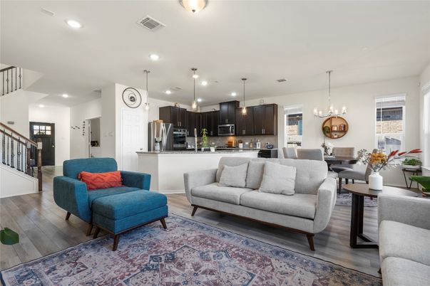 Dining room, Interior, Kitchen, Living room, Pendant Lights, Recessed Lighting, Stainless Steel Appliances, Wood Texture Flooring