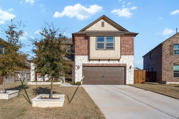 Attached, Exterior, Facade, Brick Facade, Brick Traditional