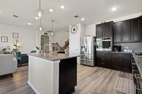 Interior, Kitchen, Pendant Lights, Recessed Lighting, Stainless Steel Appliances, Wood Texture Flooring