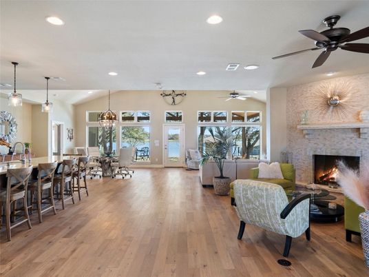 Dining room, Fireplace, Interior, Living room, Pendant Lights, Recessed Lighting, Stone Walls, Wood Texture Flooring