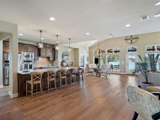 Chandelier, Dining room, Interior, Kitchen, Pendant Lights, Recessed Lighting, Stainless Steel Appliances, Wood Texture Flooring