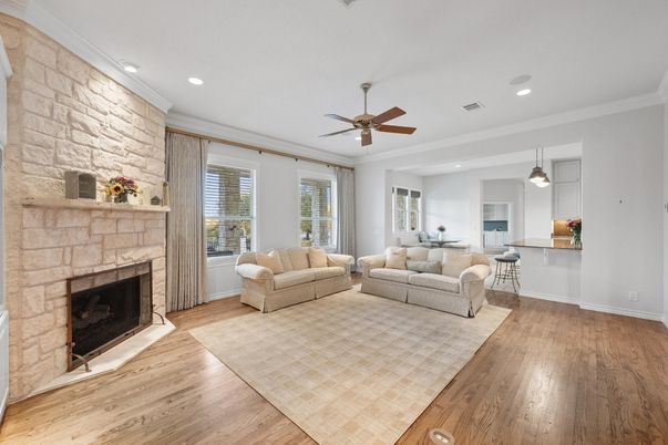 Fireplace, Interior, Living room, Pendant Lights, Recessed Lighting, Stone Walls, Wood Texture Flooring