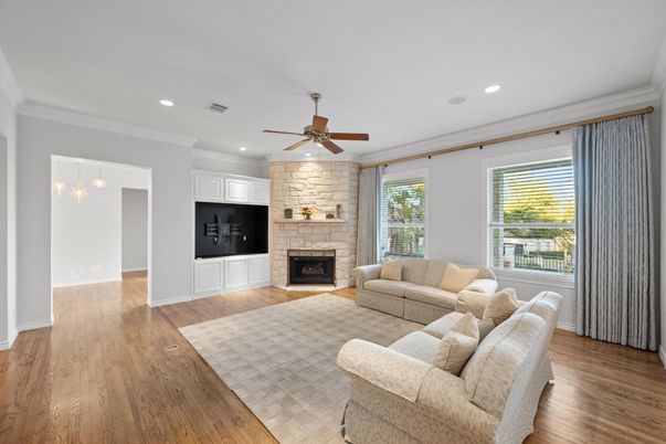 Fireplace, Interior, Living room, Pendant Lights, Recessed Lighting, Stone Walls, Wood Texture Flooring