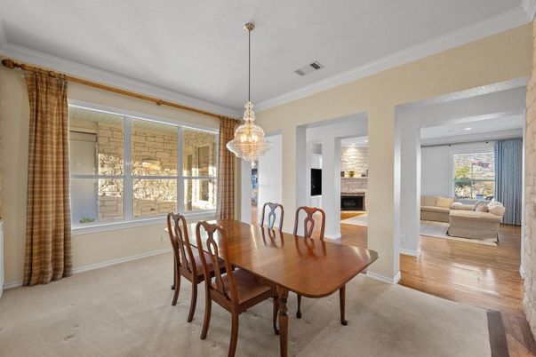 Chandelier, Dining room, Fireplace, Interior, Living room, Pendant Lights, Wood Texture Flooring