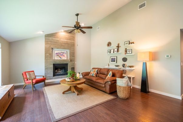 Fireplace, Interior, Living room, Recessed Lighting, Stone Walls, Wood Texture Flooring