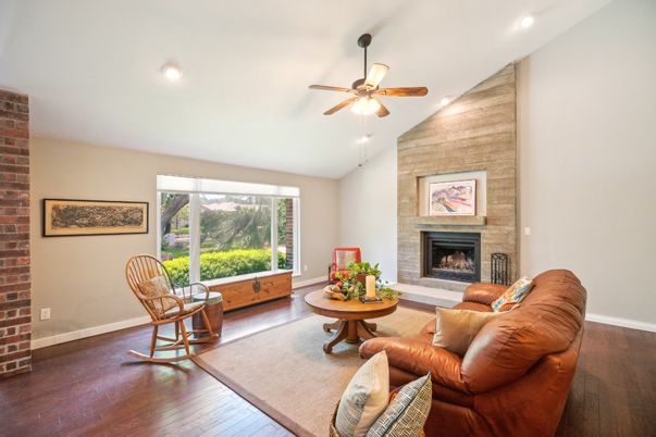 Fireplace, Interior, Living room, Recessed Lighting, Stone Walls, Wood Texture Flooring