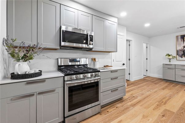 Interior, Kitchen, Recessed Lighting, Stainless Steel Appliances, Wood Texture Flooring