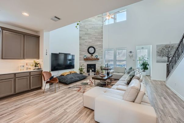 Fireplace, Interior, Living room, Pendant Lights, Recessed Lighting, Stone Walls, Wood Texture Flooring