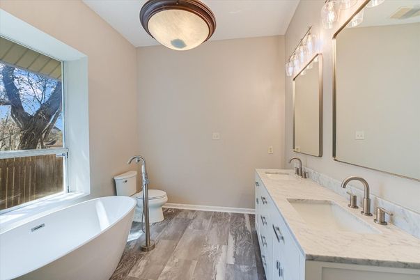 Bathroom, Dual Sink Vanities, Free Standing Baths, Interior, Wood Texture Flooring