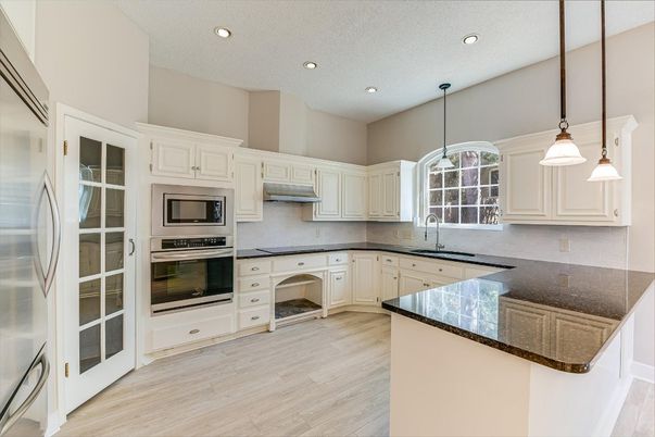 Interior, Kitchen, Pendant Lights, Recessed Lighting, Stainless Steel Appliances, Wood Texture Flooring