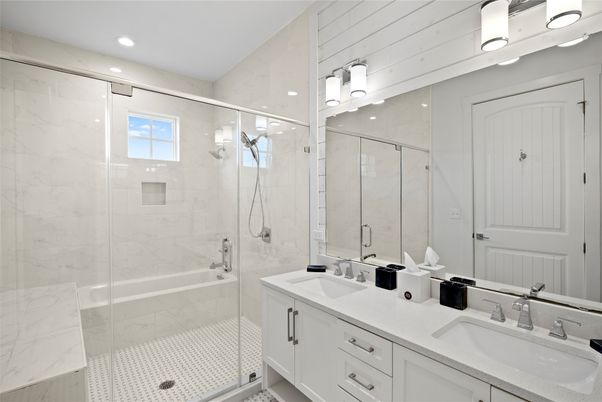 Bathroom, Dual Sink Vanities, Glass Shower, Interior, Marble Walls, Recessed Lighting