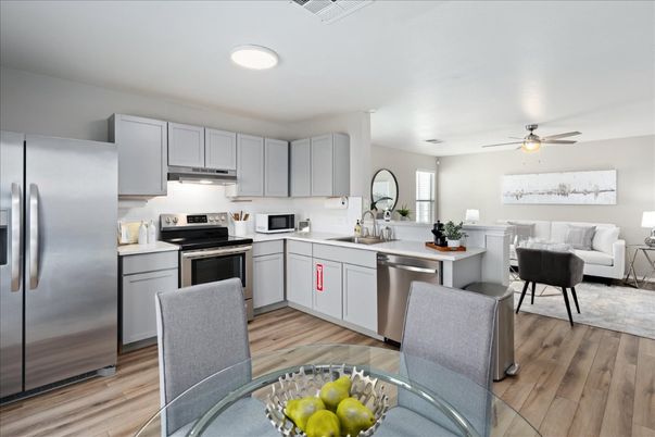 Dining room, Interior, Kitchen, Living room, Recessed Lighting, Stainless Steel Appliances, Wood Texture Flooring