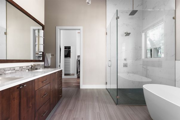 Bathroom, Dual Sink Vanities, Free Standing Baths, Glass Shower, Interior, Marble Walls, Wood Texture Flooring