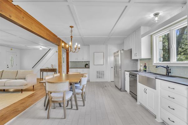 Chandelier, Dining room, Interior, Kitchen, Stainless Steel Appliances, Wood Texture Flooring