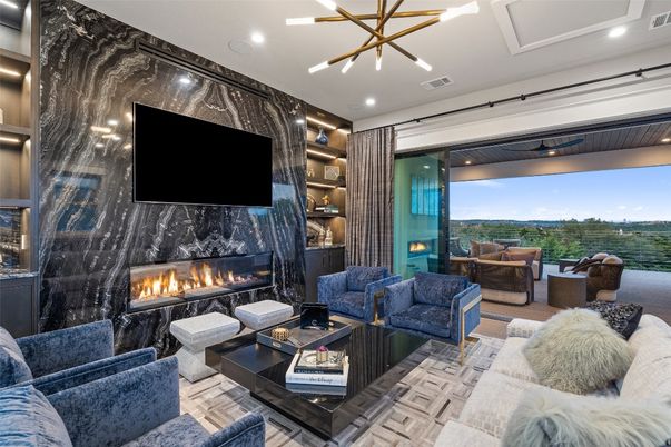 Fireplace, Interior, Living room, Marble Walls, Pendant Lights, Recessed Lighting, Wood Texture Flooring